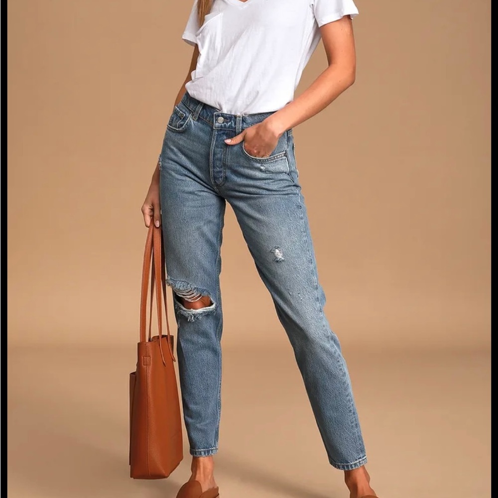 Boyish by her denim jeans